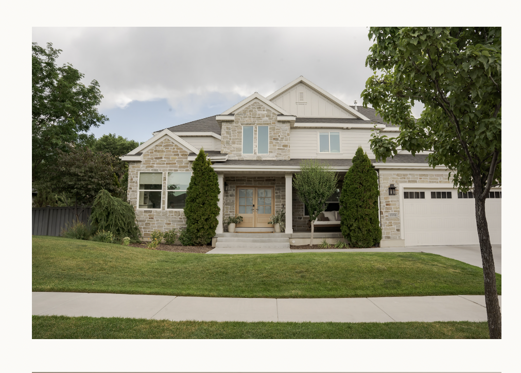 Corner Canyon Home stone and siding exterior